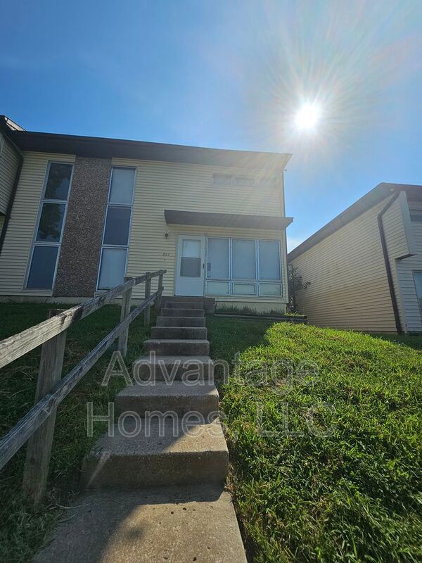Spacious 3BR Townhome – Finished Basement, Private Patio, Carport property image